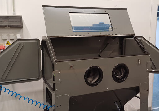 Cabina para limpieza neumática